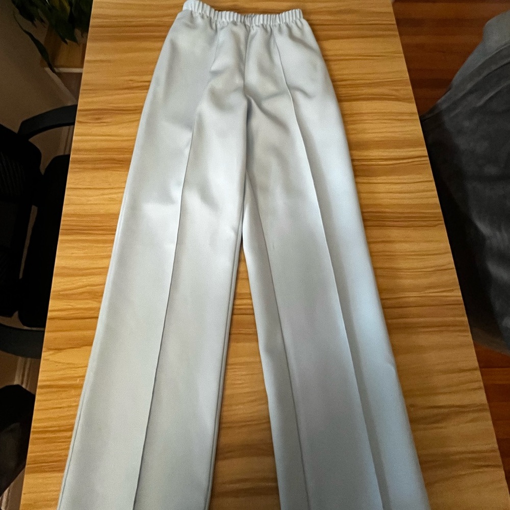 Women’s light blue pleated pants